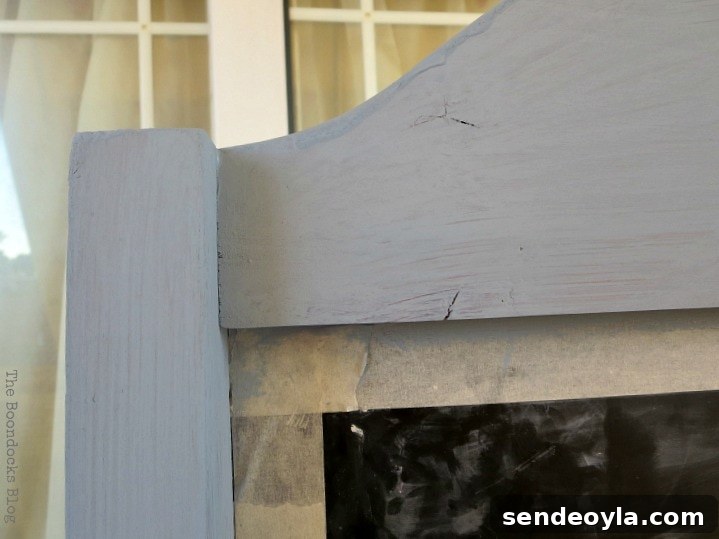 How to Upcycle a Vintage Chalkboard Stand 6 making tape to cover the blackboard, and first coat of paint