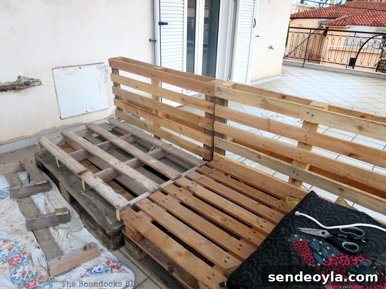 How to Build a DIY Pallet Sofa Without Tools 7 front view of pallets