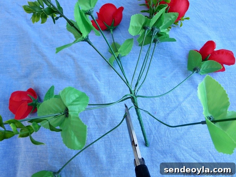 DIY Colorful Fence with Dollar Store Flowers 7 Separating the flowers of the red rose flower bouquet.