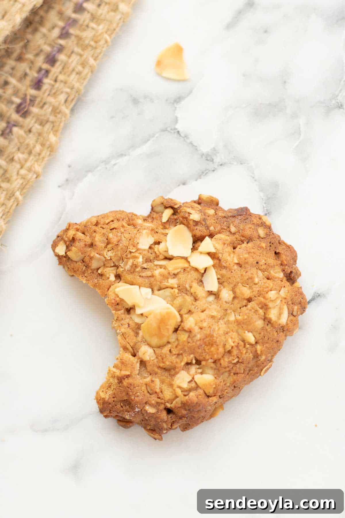 Classic Crunchy Anzac Biscuits Recipe 9 Half eaten oat biscuits