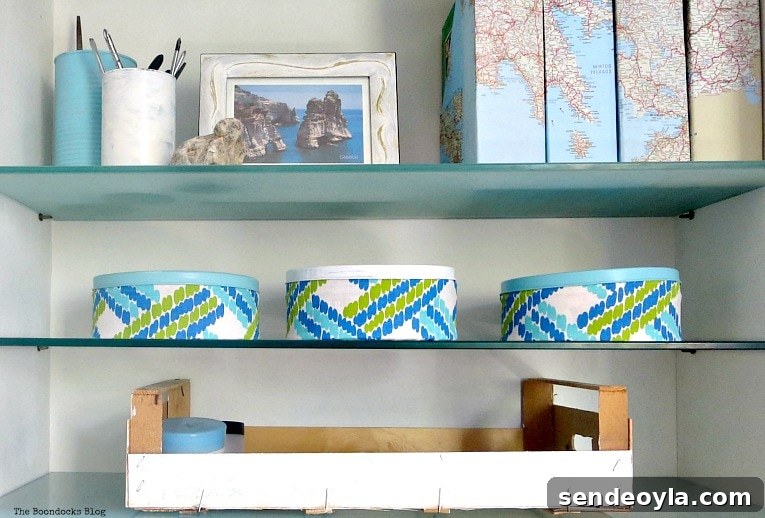 cookie tin cans decoupaged with fabric and a crate, Pretty and Practical Bookcases the Easy Way