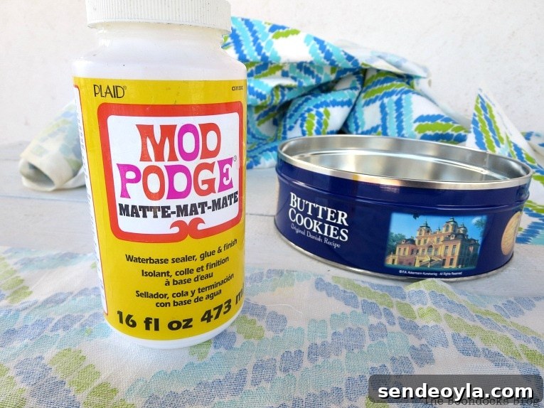gluing the fabric with mod podge