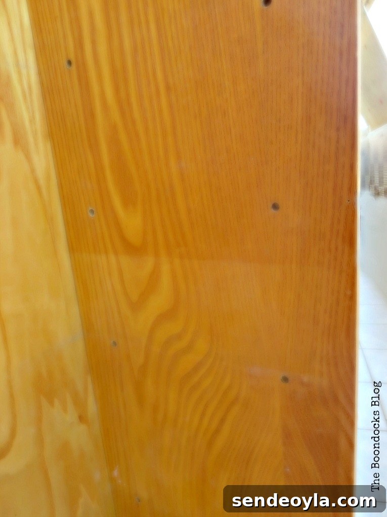 Avoid These Mistakes When Upcycling Bookcases 4 Side of the bookcase with discoloration.