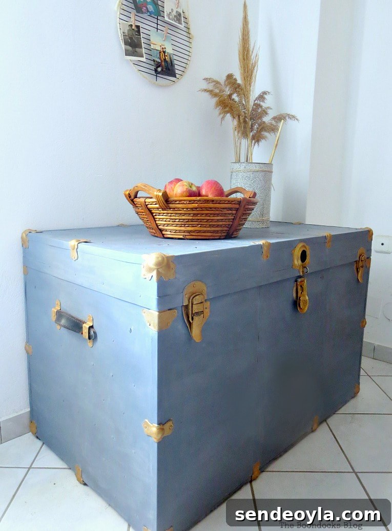 A beat-up vintage metal trunk painted with Old Fashioned Milk Paint.
