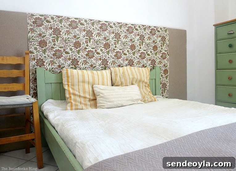bedframe with background covered in fabric, How to Easily Warm up a Room with Fabric