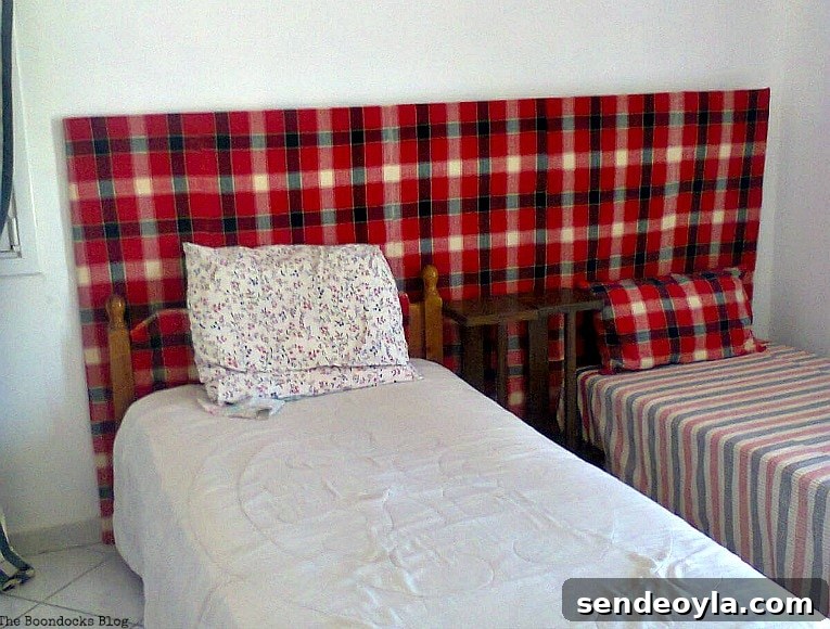 headboard covered with red plaid fabric, How to Easily Warm up a Room with Fabric