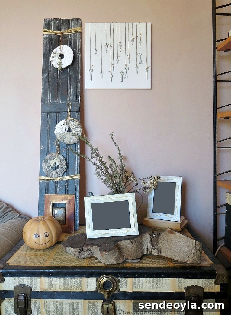 Canvas with Keys next to display in living room, How to Make Simple CanvasWall Art with Keys, www.theboondocksblog.com