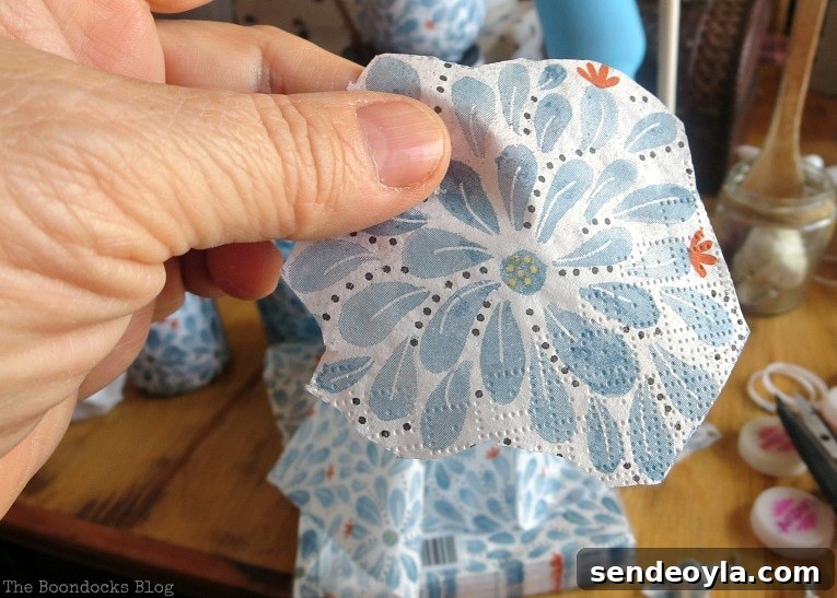 Close up of a cut flower shape from the napkin.