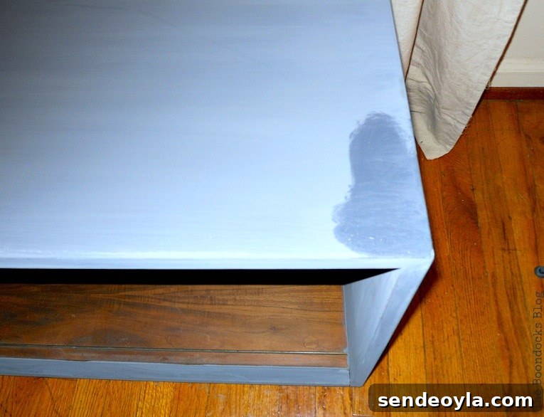 adding the beeswax, Mid-Century Modern Sideboard Upcycled with OFMP www.theboondocksblog.com