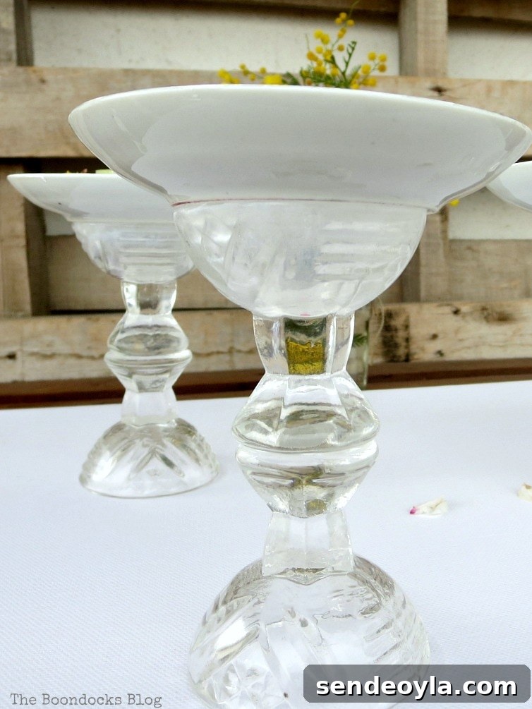 DIY Spring Pedestal from Upcycled Cordial Glasses and Saucers 14 Close up of the cordial glasses and saucer made into a pedestal.
