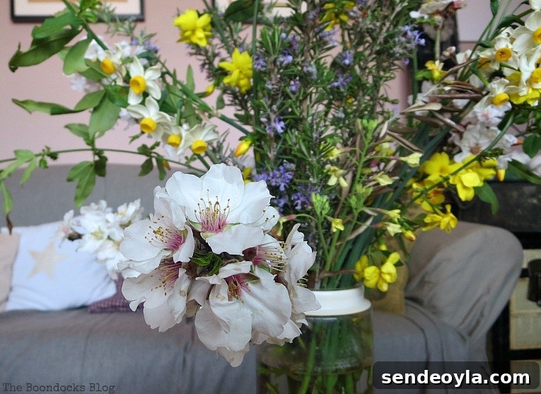 DIY Spring Pedestal from Upcycled Cordial Glasses and Saucers 3 Almond branch and spring flowers.