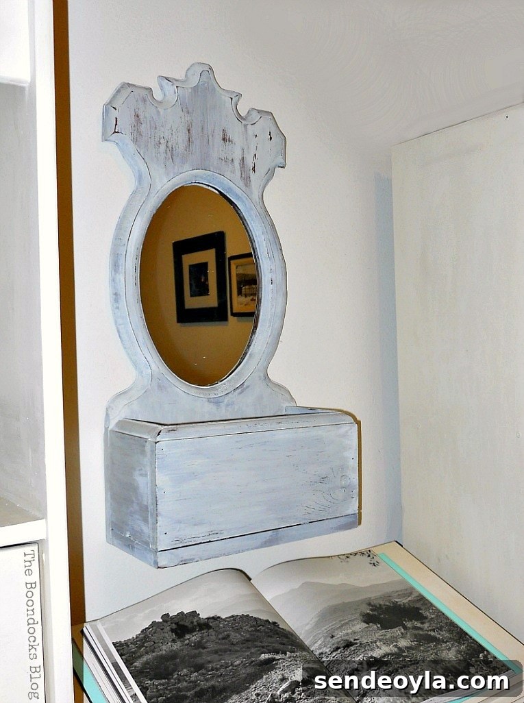 Finished mirror above the dictionary stand