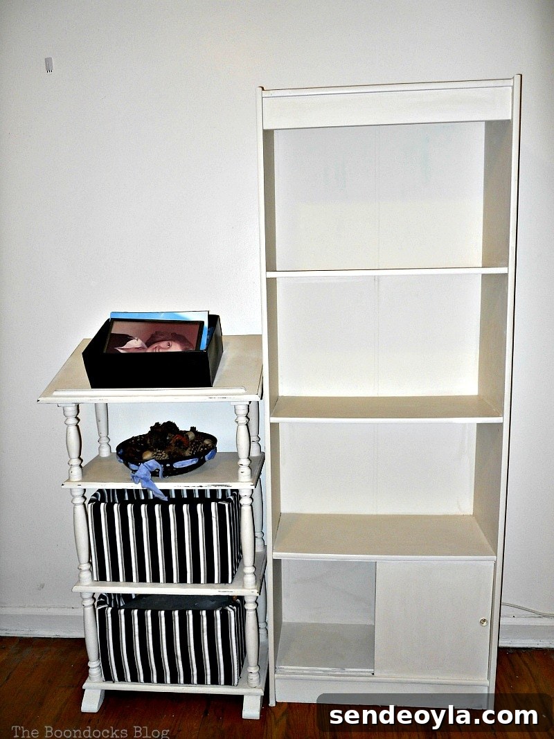 Transform Bookcases with Paint and Wrapping Paper 8 Placing a white painted bookcase next to a stand.