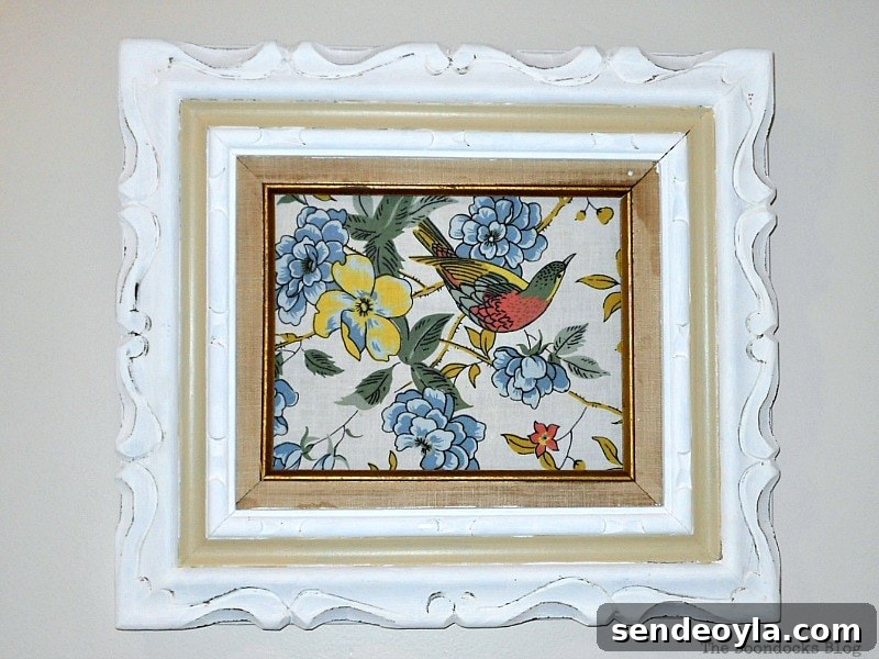 Framed decoupaged fabric