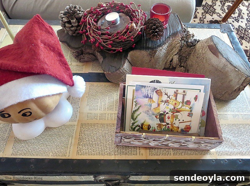 Decoupaged trunk with wooden centerpiece, How to Repurpose your Decor for a Unique Christmas Look