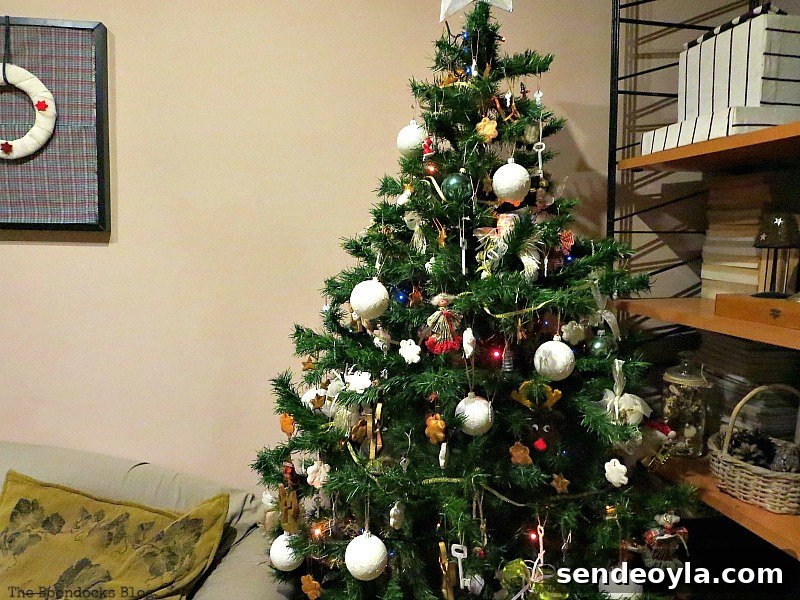 The tree next to the wall unit