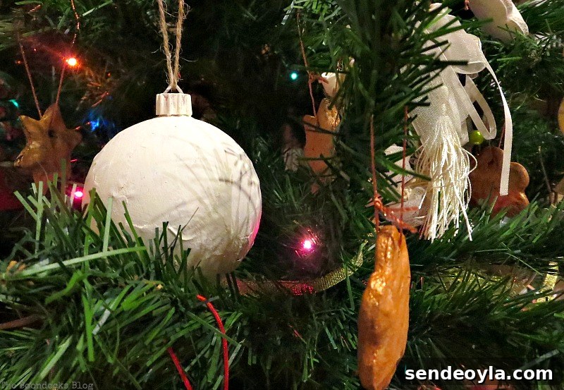 White globes with twinkling lights