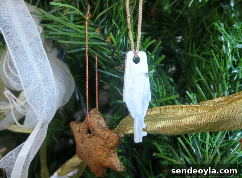 Creative DIY Ideas to Upcycle Your Christmas Tree 12 Thick gold ribbon and a key