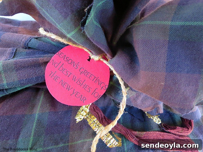Repurposed flannel shirt into gift wrapping
