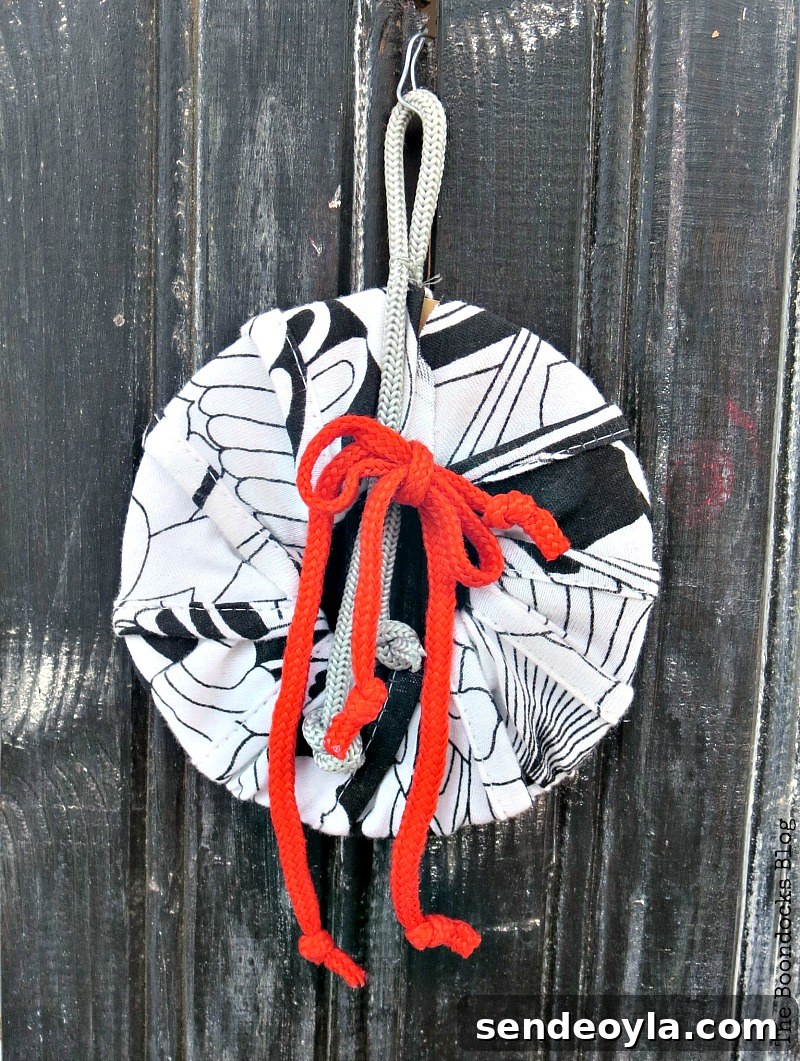 DIY Christmas Card and Ornament Display Ideas 6 Back and white with red ornament, A Display for Christmas Cards and Ornaments