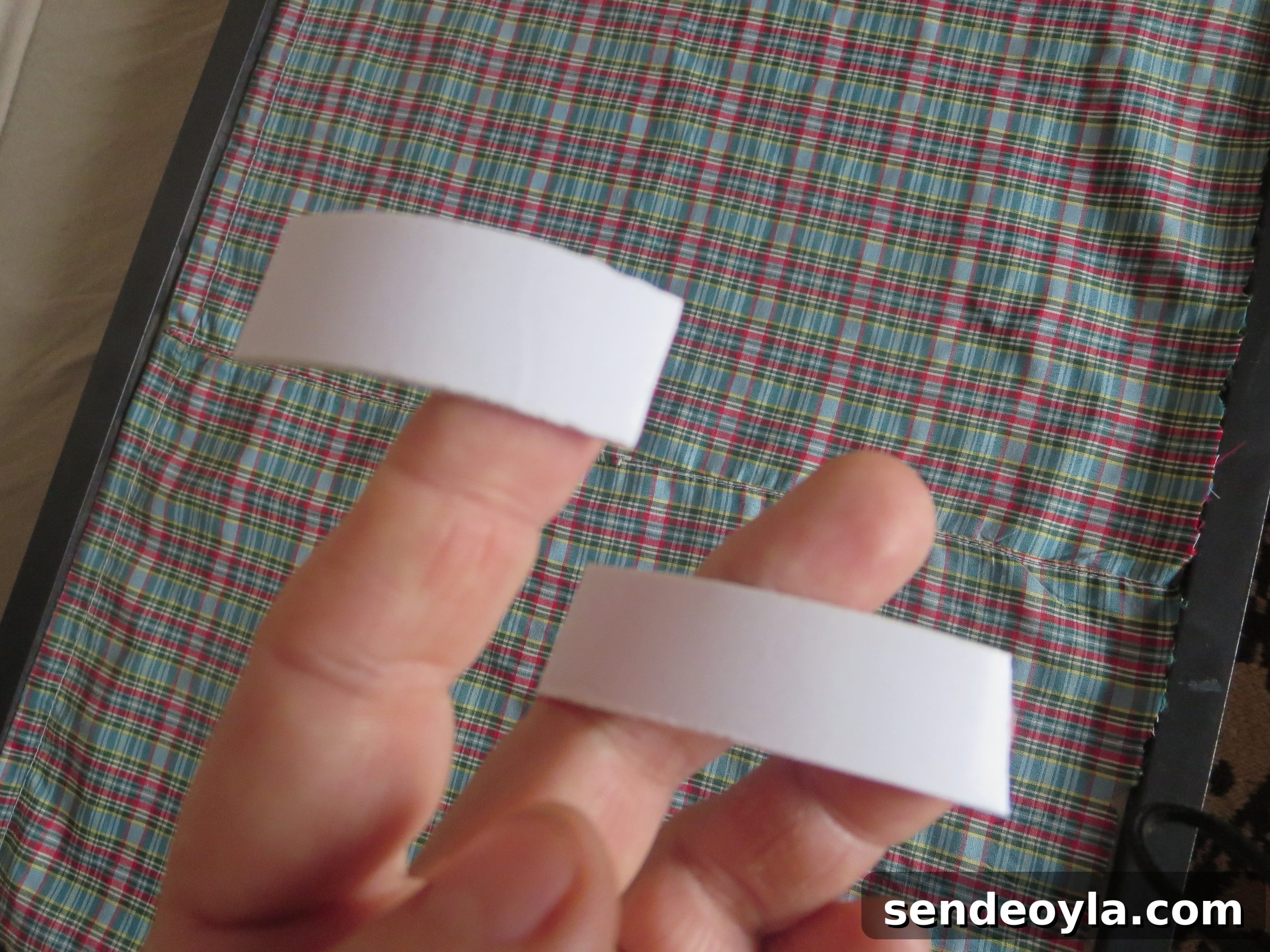 Adding fabric with sticky tape to the glass, Christmas Picture Frames with Wreaths the Lazy Way www.theboondocksblog.com