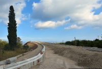 Railroad Overpass: City Skyline and Train Track Views