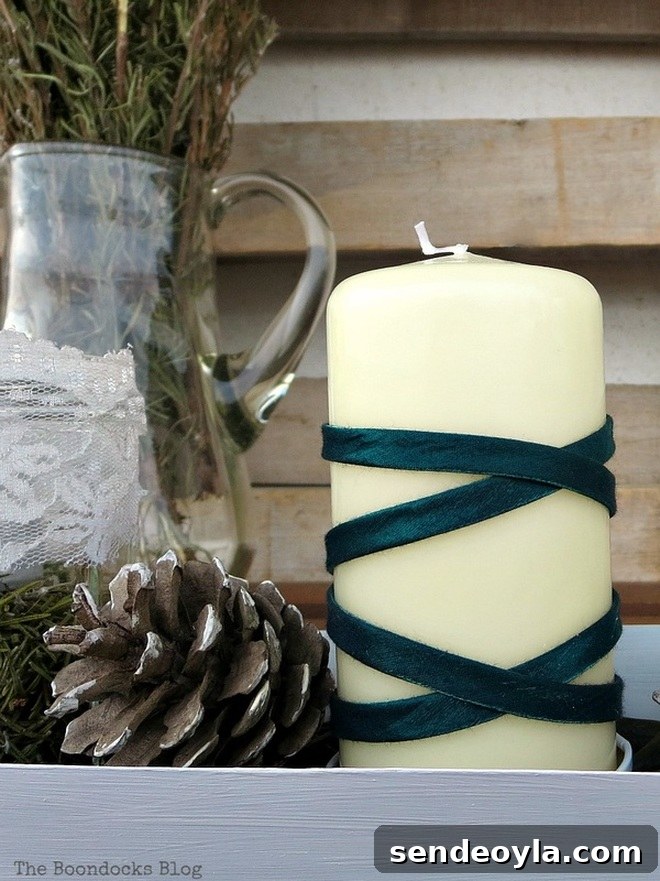 Green Christmas Centerpiece Ideas to Wrap Up the Holidays 14 Candle wrapped in green ribbon for a Christmas centerpiece, Easy Green Christmas Centerpieces