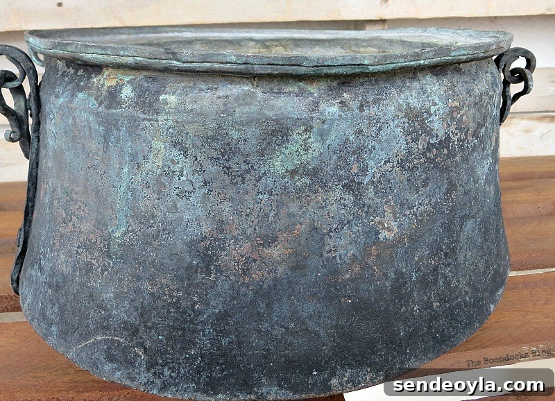 After it was cleaned, A repurposed Antique Cauldron for Christmas theboondocksblog