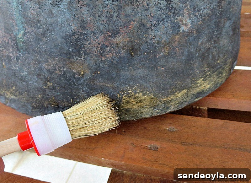 Brushing on the brass, A repurposed Antique Cauldron for Christmas theboondocksblog