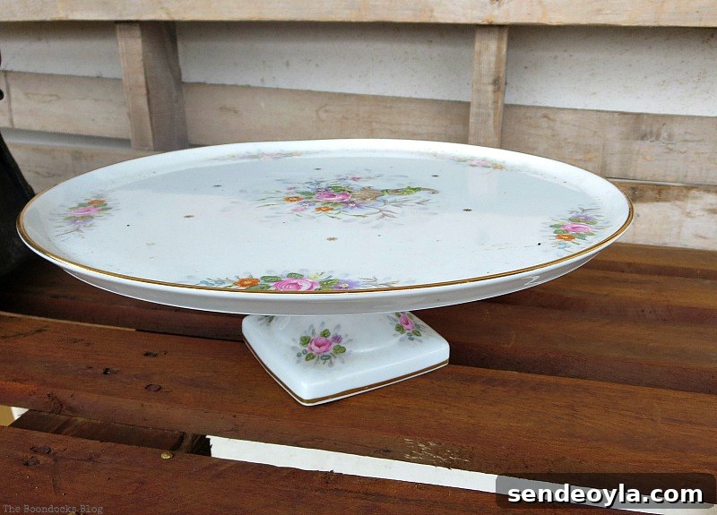 A cake stand, A repurposed Antique Cauldron for Christmas theboondocksblog