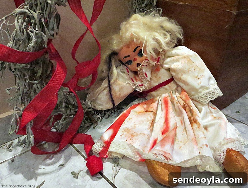 Doll eats too much and falls off her wreath, Paranoid Man goes to the Halloween Party