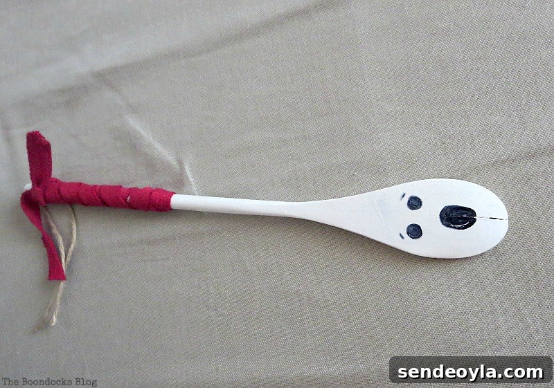 wooden spoon painted as a ghost, How to make a fun tube Halloween Wreath www.theboondocksblog.com