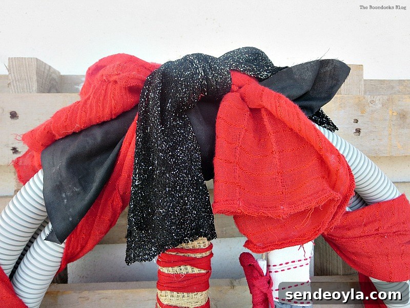 Black sparkly fabric, How to make a fun tube Halloween Wreath www.theboondocksblog.com