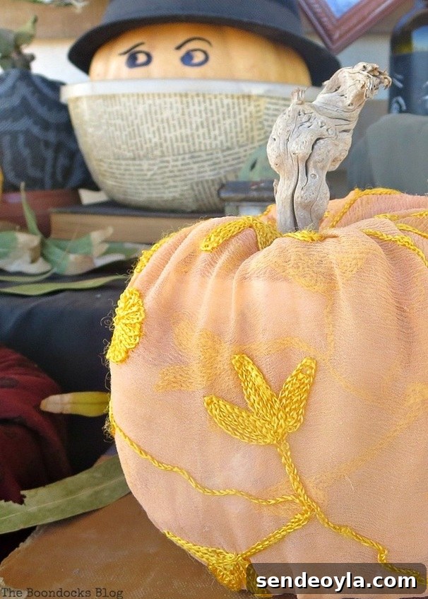 black fedora wearing pumpkin