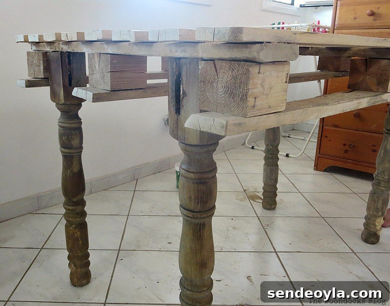 How to Build a Pallet Table with Reclaimed Wood Legs 5 Attaching the legs, The Drunken Table and a Fall Vignette www.theboondocksblog.com