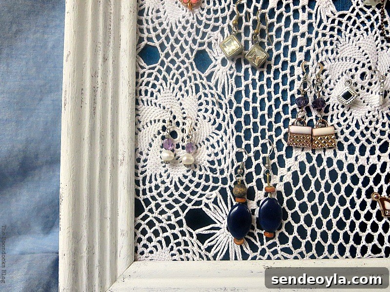 DIY Earring Organizer Ideas to Declutter Your Jewelry 12 Close up of the earrings and earring organizer.