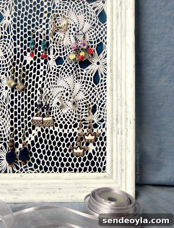 DIY Earring Organizer Ideas to Declutter Your Jewelry 14 Close up of the earrings and earring organizer.