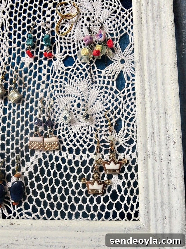 DIY Earring Organizer Ideas to Declutter Your Jewelry 10 Hanging the earrings from the doily.
