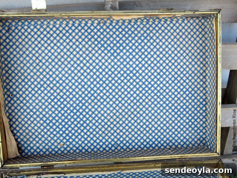 The inside before, What's Inside the Vintage Suitcase? www.theboondocksblog.com