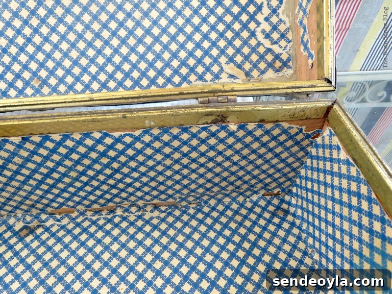 Rusty metalwork before, What's Inside the Vintage Suitcase? www.theboondocksblog.com