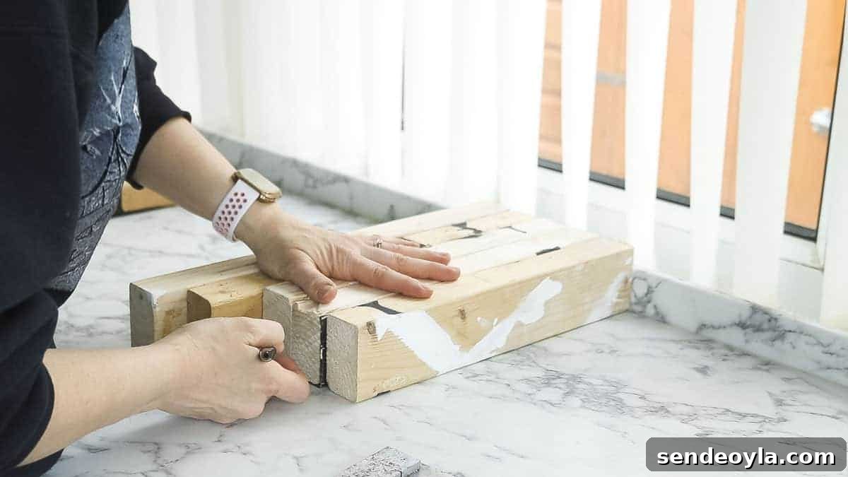 DIY TV Stand from Scrap Wood: Step-by-Step Guide 6 Marking scrap wood for a beginner's woodworking project