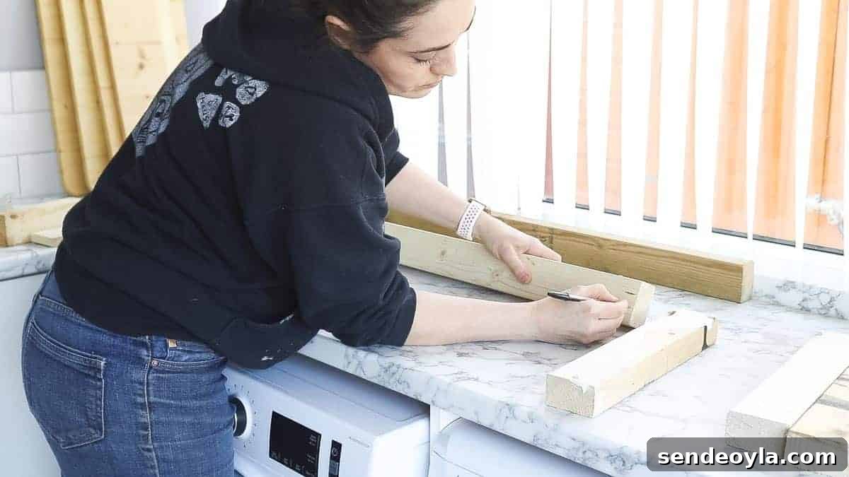 DIY TV Stand from Scrap Wood: Step-by-Step Guide 8 The Carpenter's Daughter marking timber for pocket holes
