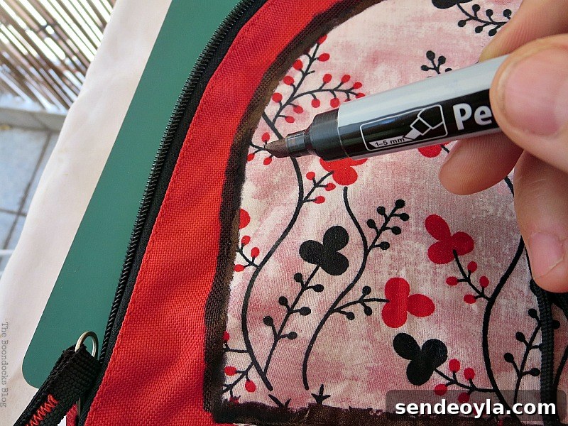 DIY Upcycled Backpack from Old Clothes 10 Creating a border with marker