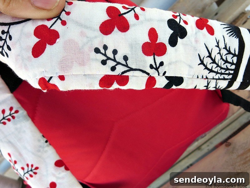 DIY Upcycled Backpack from Old Clothes 12 Sewing fabric onto the straps
