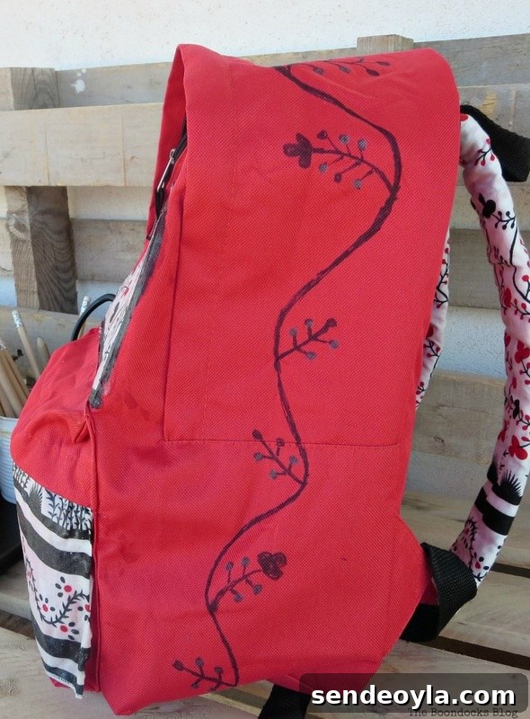 DIY Upcycled Backpack from Old Clothes 14 Metallic detail on floral design