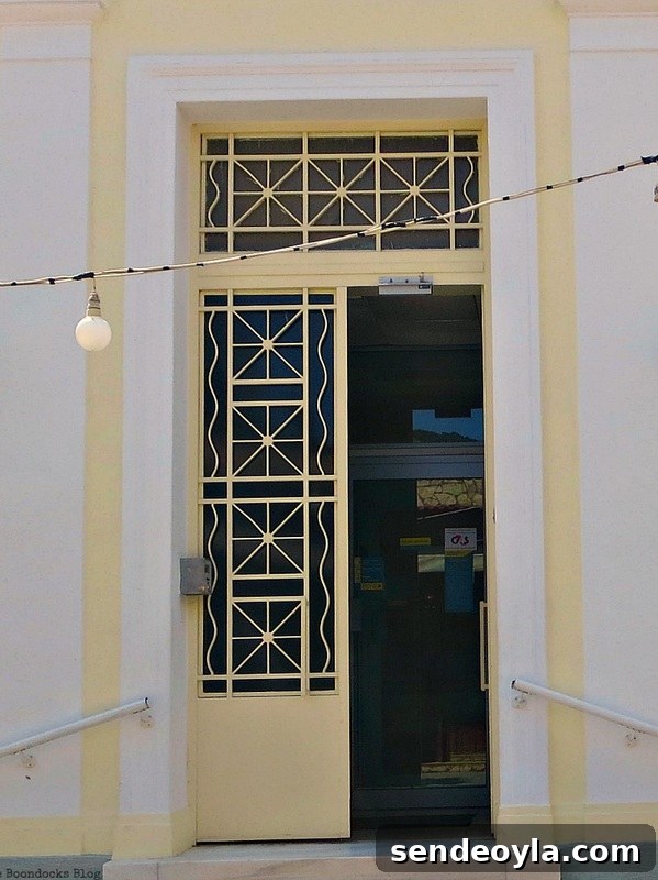 The Doors of Greece: A Kind of Anniversary 13 Opened yellow metal door, Doors and a Sorta Blogoversary