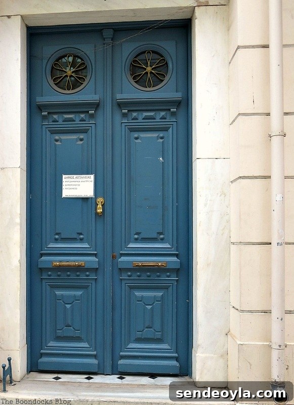 Blue door with circular windows, Doors and a Sorta Blogoversary
