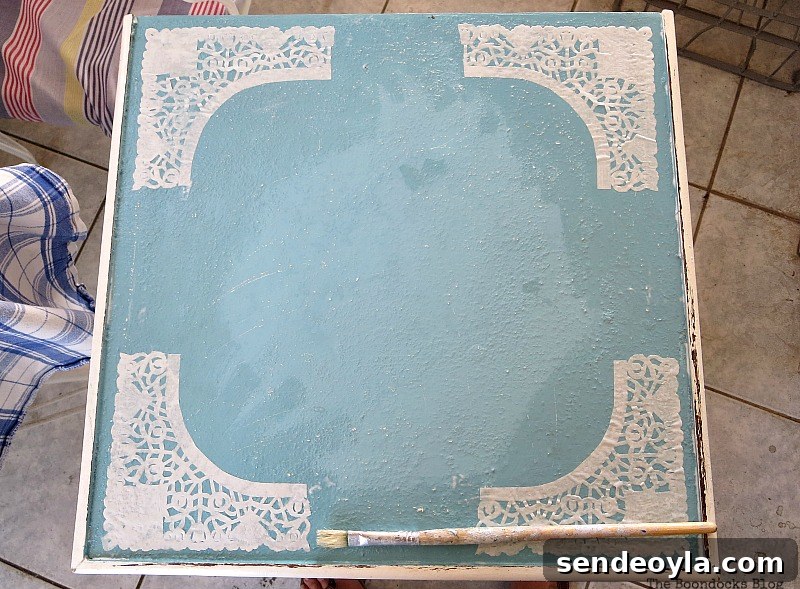 Decoupaged doily pieces, The Doily Top Side Table www.theboondocksblog.com