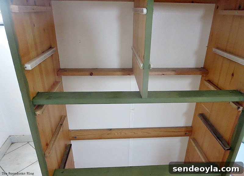 Rescue and Refinish an IKEA Pine Dresser 5 First coat of dark green paint, How to save an Ikea Pine Dresser www.theboondocksblog.com