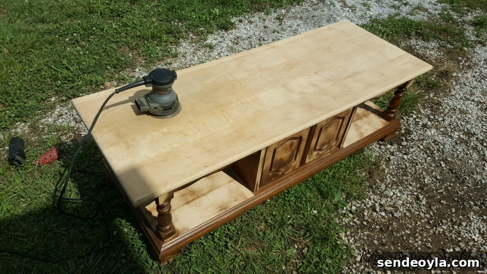 DIY Curbside Coffee Table Makeover 4 Sanding the table top to bare wood